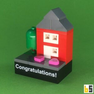 Glückwunsch! (Neues Zuhause) – Bausatz aus LEGO®-Steinen